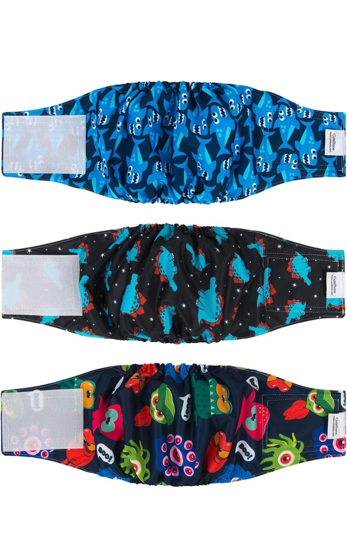 Three colorful reusable swim diapers with shark, dinosaur, and monster designs.